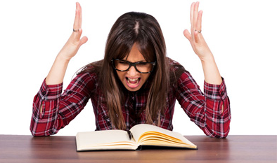 Woman screaming at a book